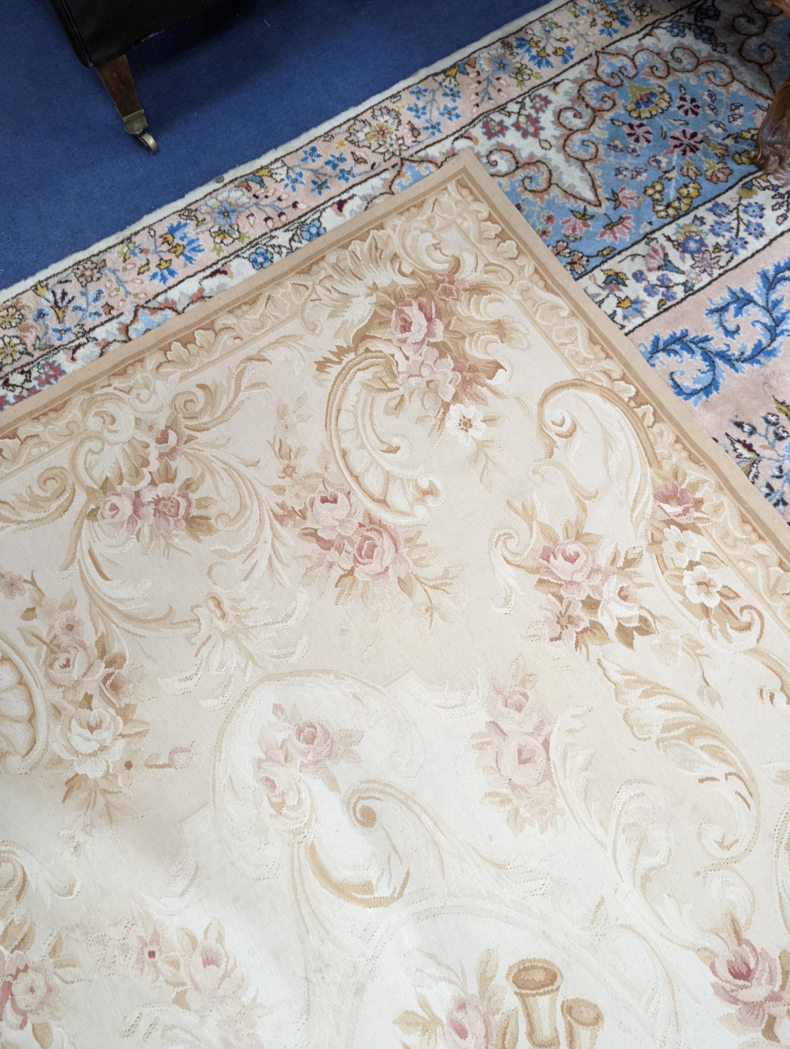 An Aubusson gold ground rug with rose pattern, 244 x 153cm